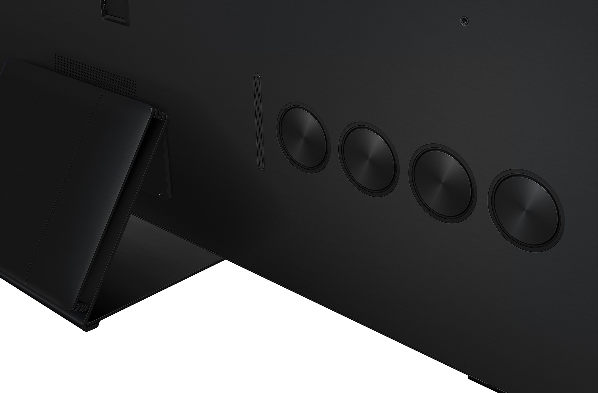 Widok z tyłu czarnego telewizora Samsung. Pokazuje podstawę, porty i okrągłe przyciski sterowania.