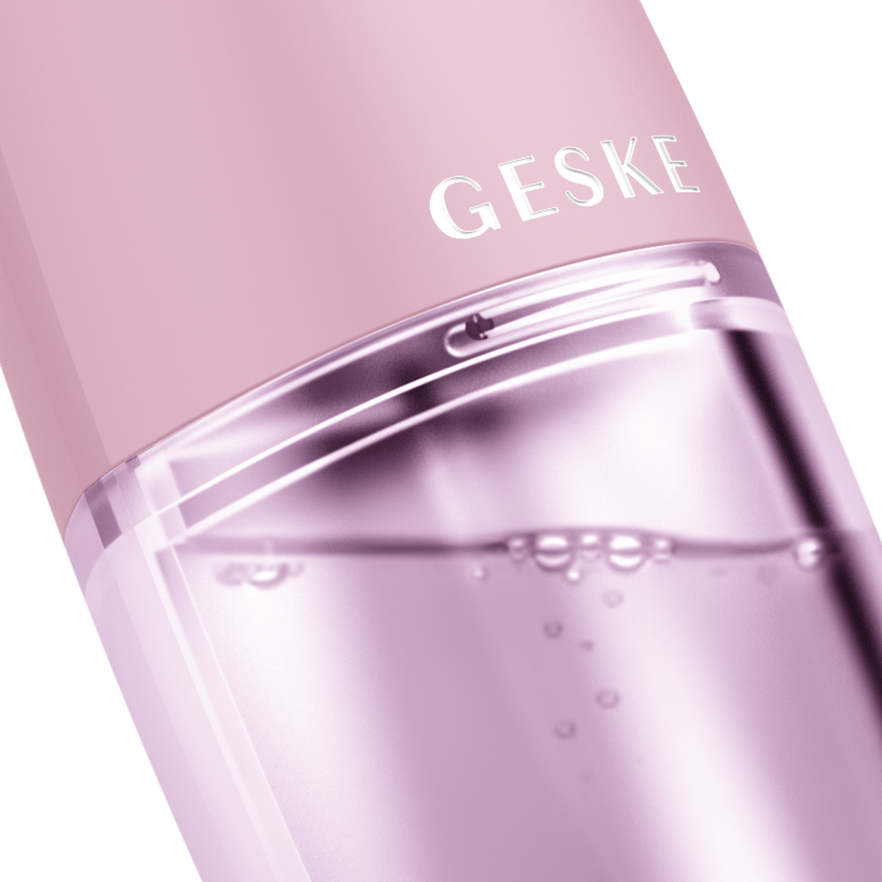Pembe Geske cihazının yakın çekimi. 'GESKE' metni ve cihazın içindeki berrak sıvı.