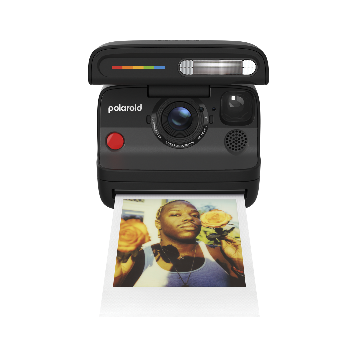 Zwarte Polaroid camera met een foto van een persoon die rozen vasthoudt. De camera heeft een rode knop en een regenboogstreep.