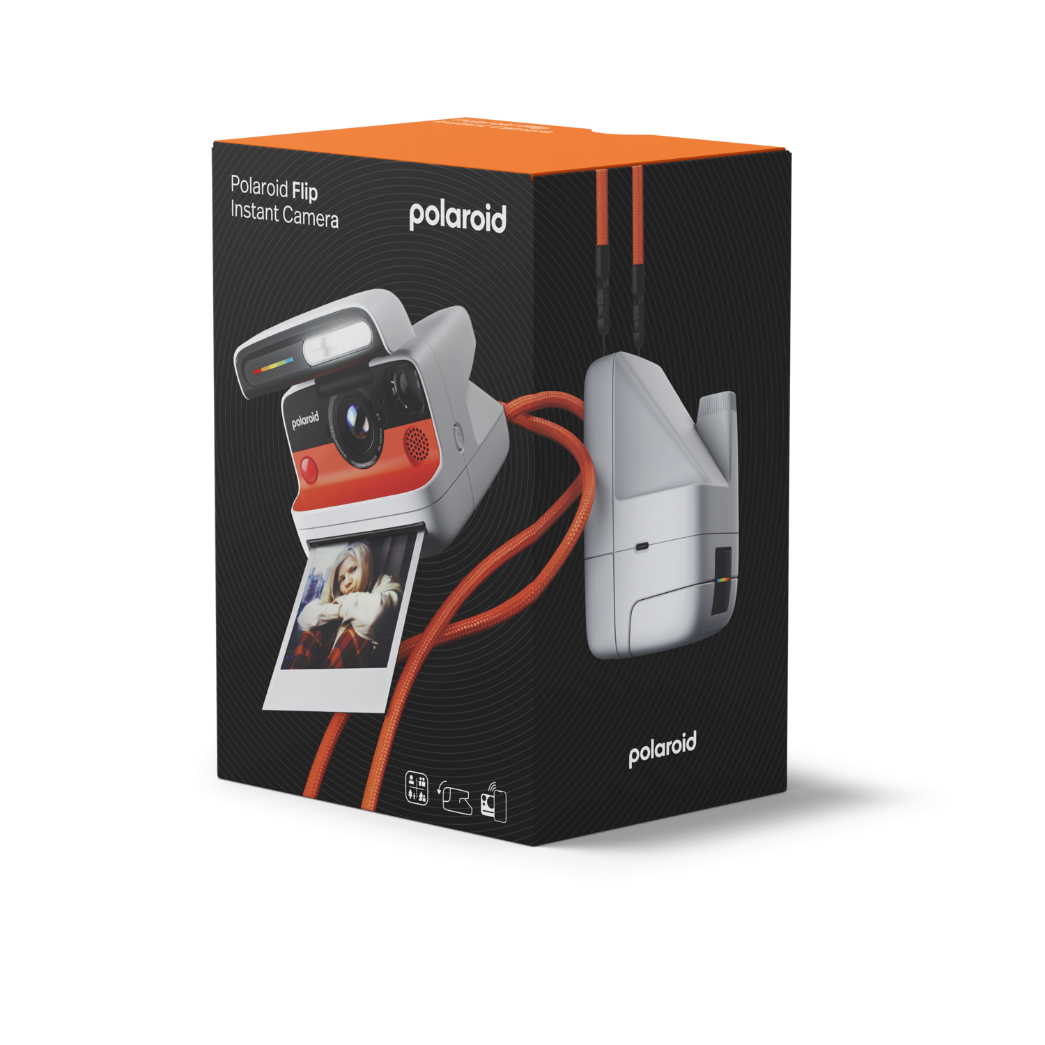 A Polaroid Flip instant camera and its charging stand on a black box. The camera is gray and orange, with an orange strap.