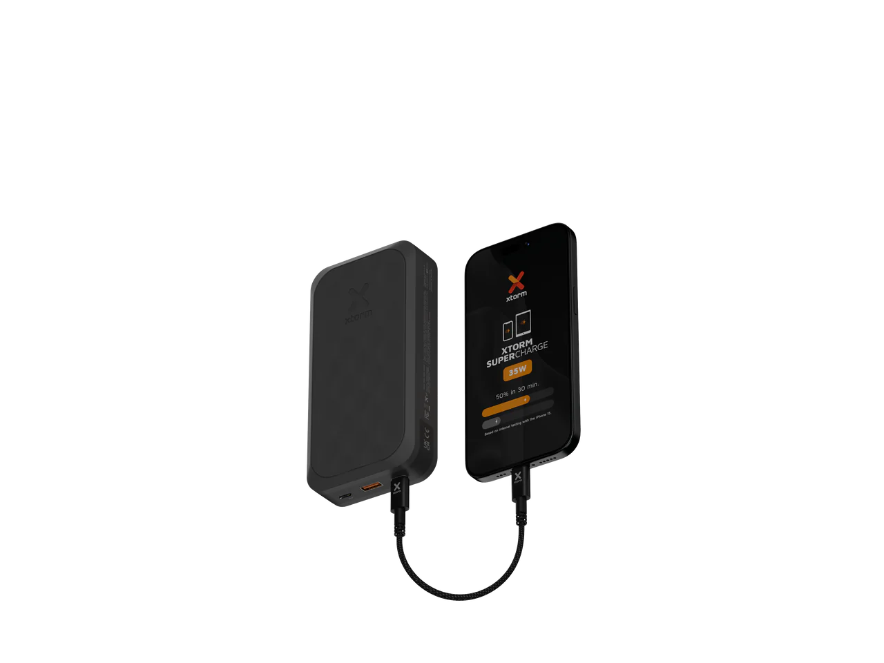 Banco de energía negro conectado a un teléfono con pantalla negra.