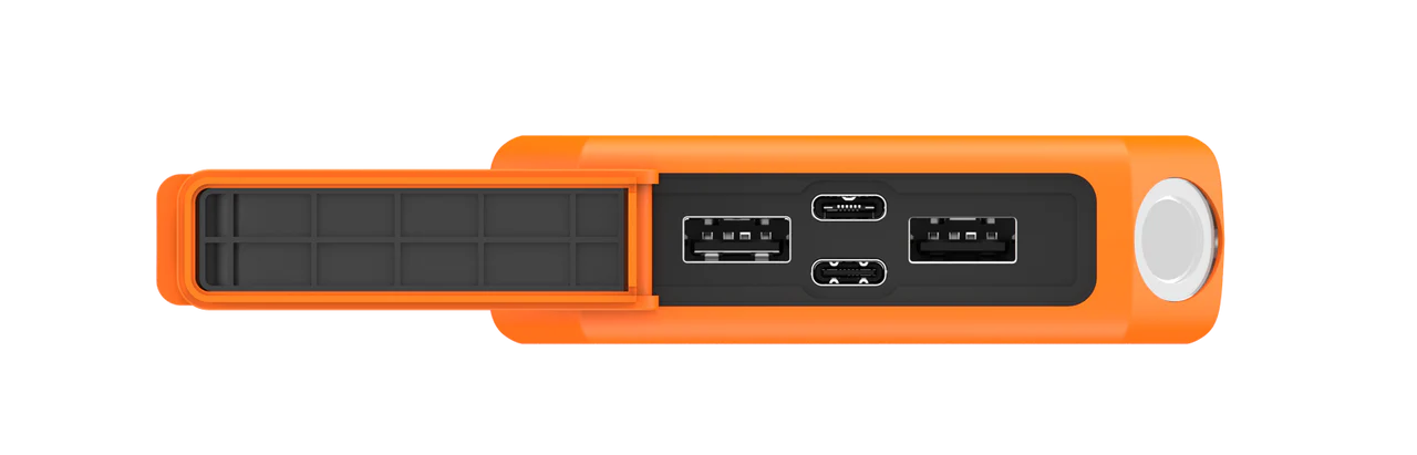 Disco duro externo naranja con puertos y compartimento. Fondo negro. Puertos incluyen USB y USB-C. El compartimento está abierto.