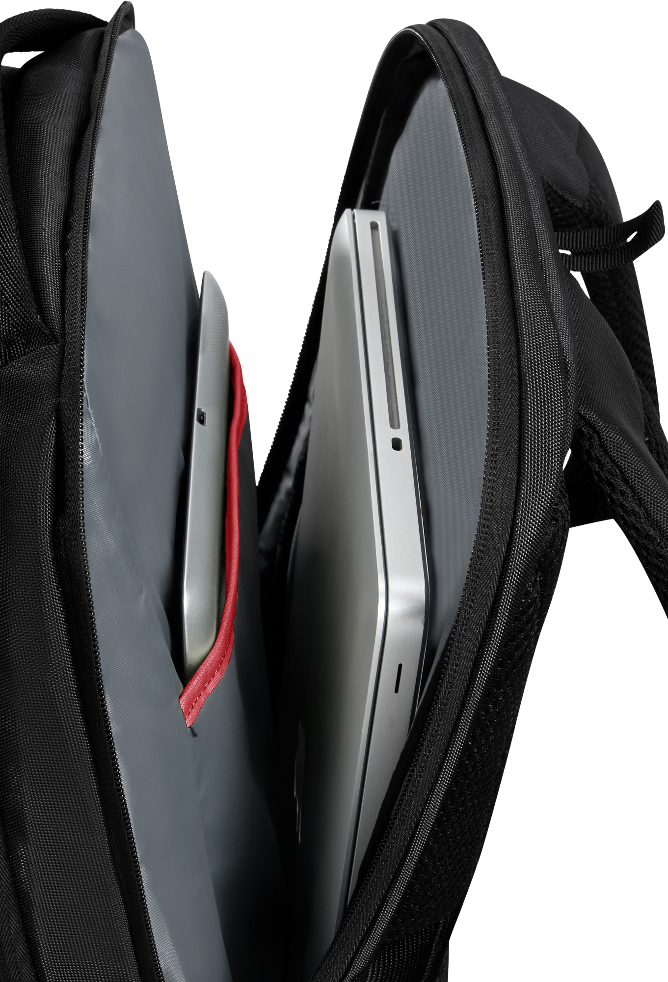 Czarny plecak otwarty, pokazujący tablet i laptopa.