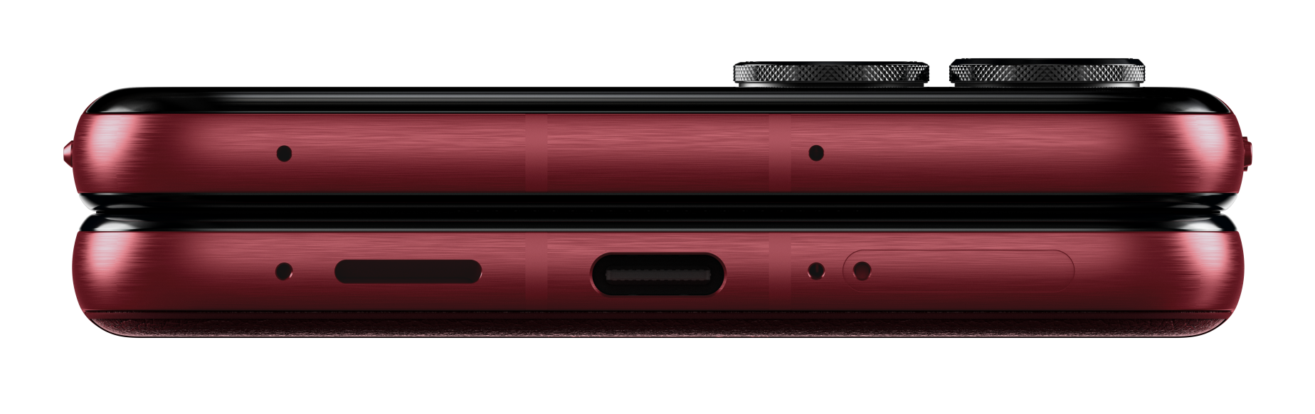 Widok od dołu czerwonego telefonu Motorola Razr, z portem ładowania i głośnikiem.