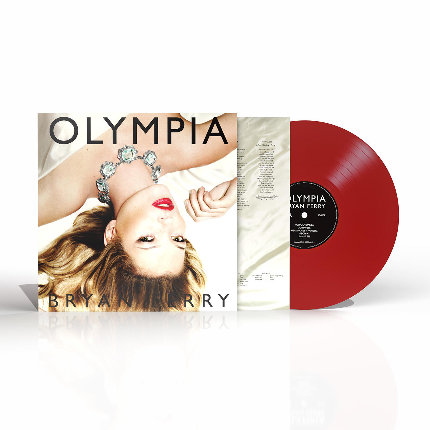 Albumcover mit einer Frau kopfüber, Schmuck, roter Lippenstift. Eine rote Vinyl-Schallplatte wird gezeigt.