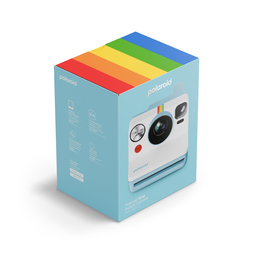 Üstünde gökkuşağı şeridi olan Polaroid kamera kutusu. Kutuda kameranın görüntüleri ve metin var.