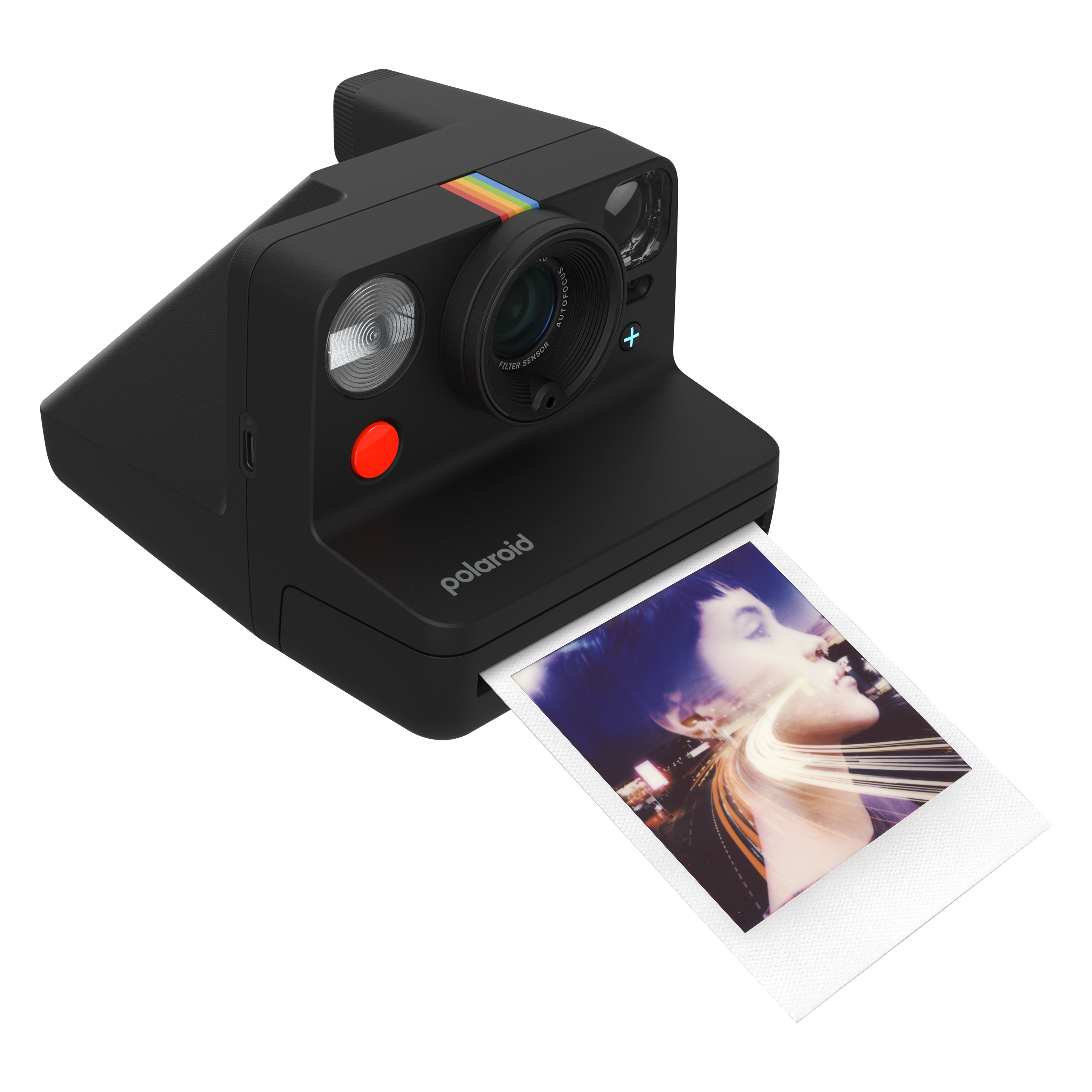 Siyah Polaroid fotoğraf makinesi, bir kadının profilini gösteren bir resim çıkıyor.