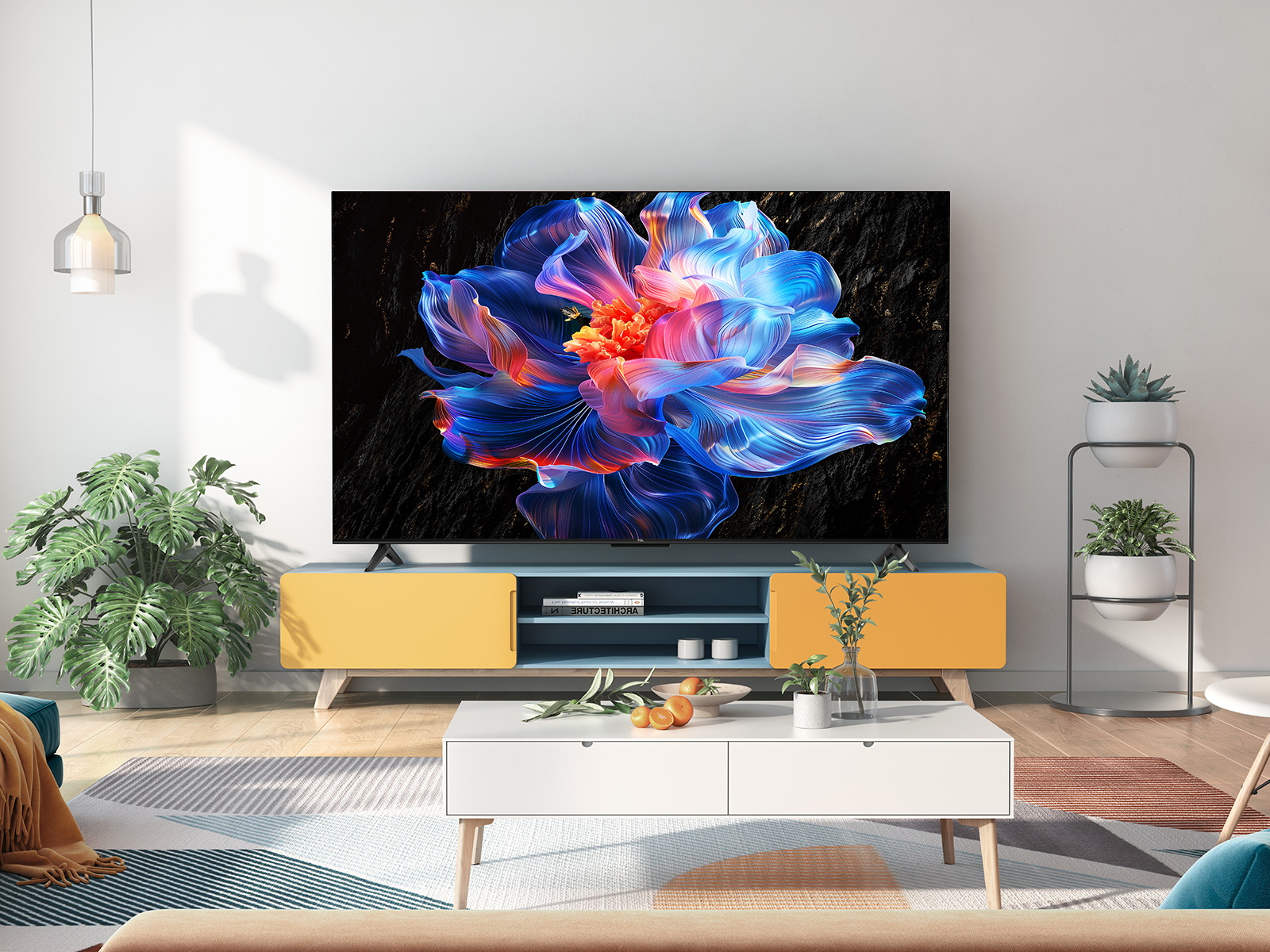 Salón con TV mostrando imagen floral colorida. Mesa blanca y plantas también.