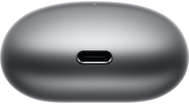 Felülnézet egy szürke töltőtokról USB-C porttal.