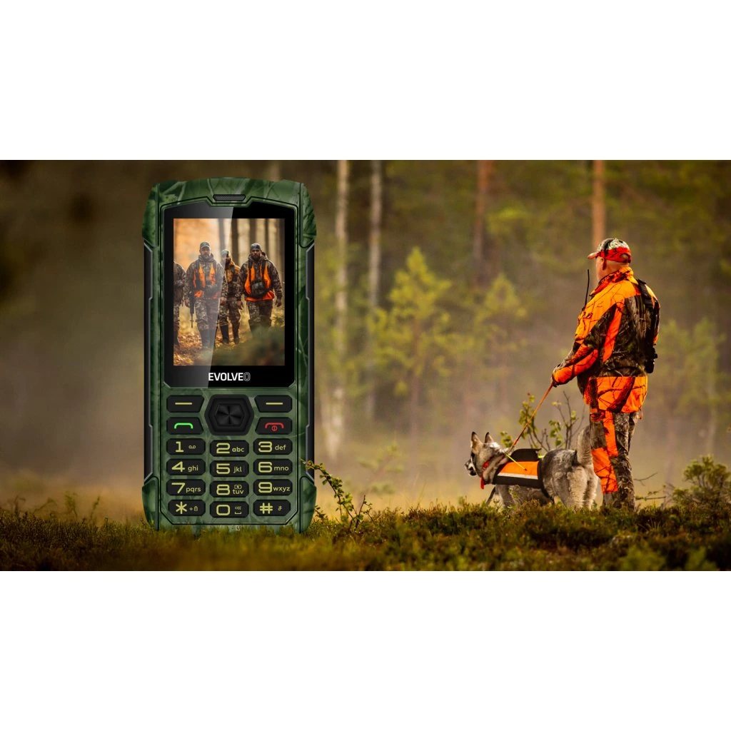 Egy asztal túlélőeszközökkel és egy zöld telefonnal.