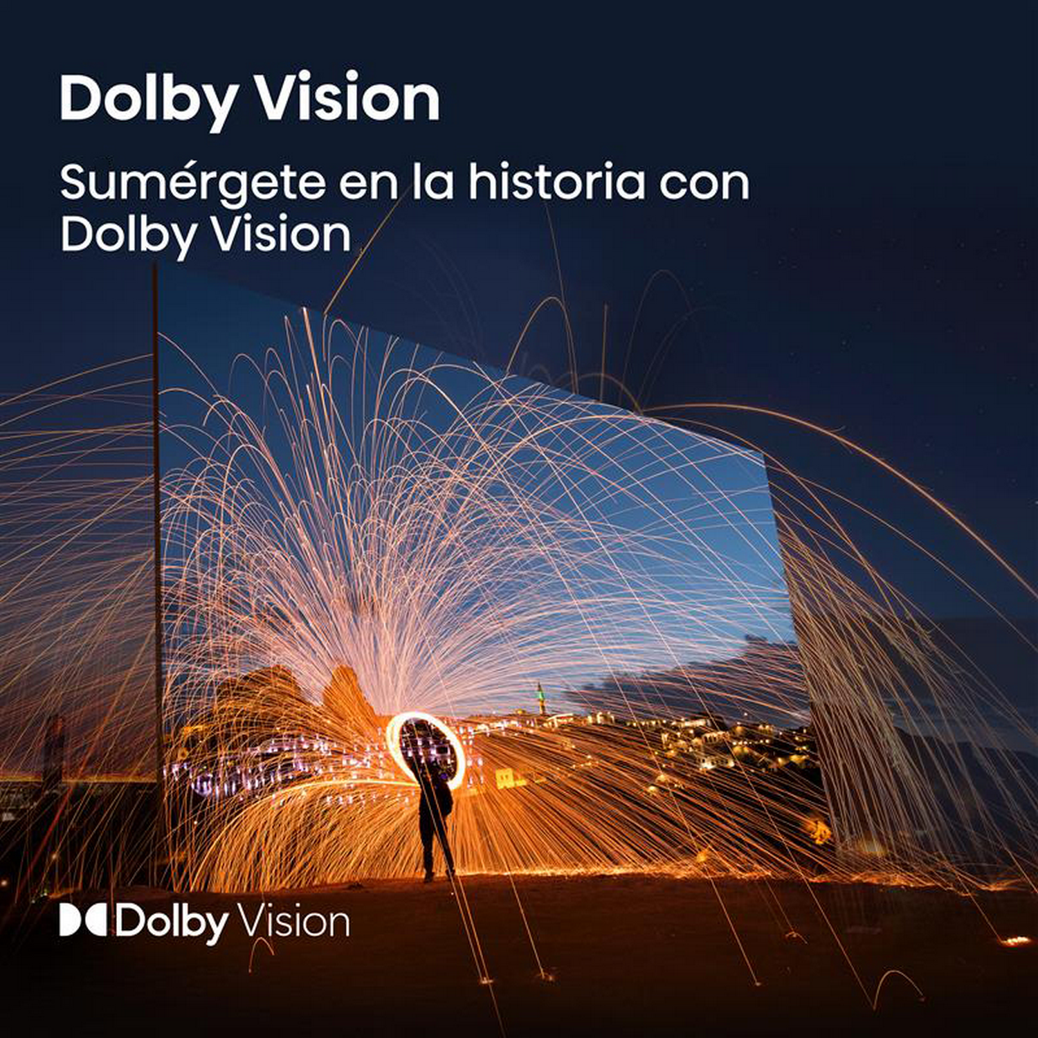 Dolby Vision, persona sosteniendo círculo de fuego, fondo oscuro, chispas en el aire.