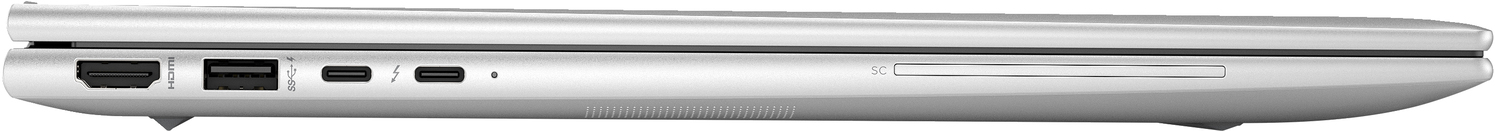 Laptop plateado, vista lateral. Muestra puertos y una ranura para tarjetas.