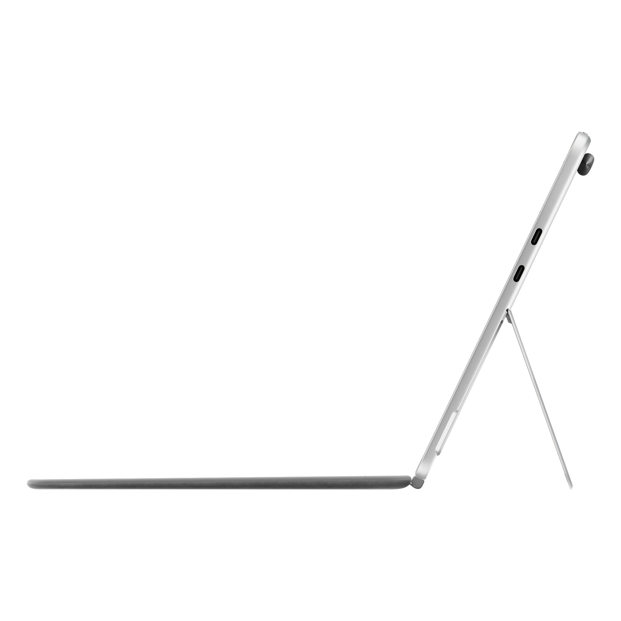 Tablette argentée avec clavier marron foncé. La tablette est soutenue par un support noir.