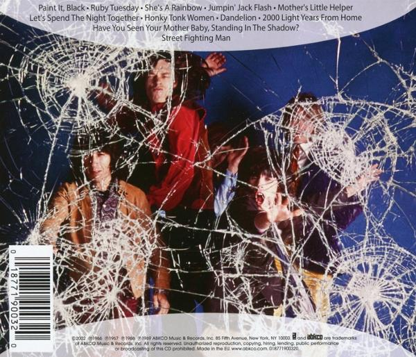 Pochette d'album avec des membres du groupe derrière une vitre brisée. Noms de chansons et un code-barres en bas.