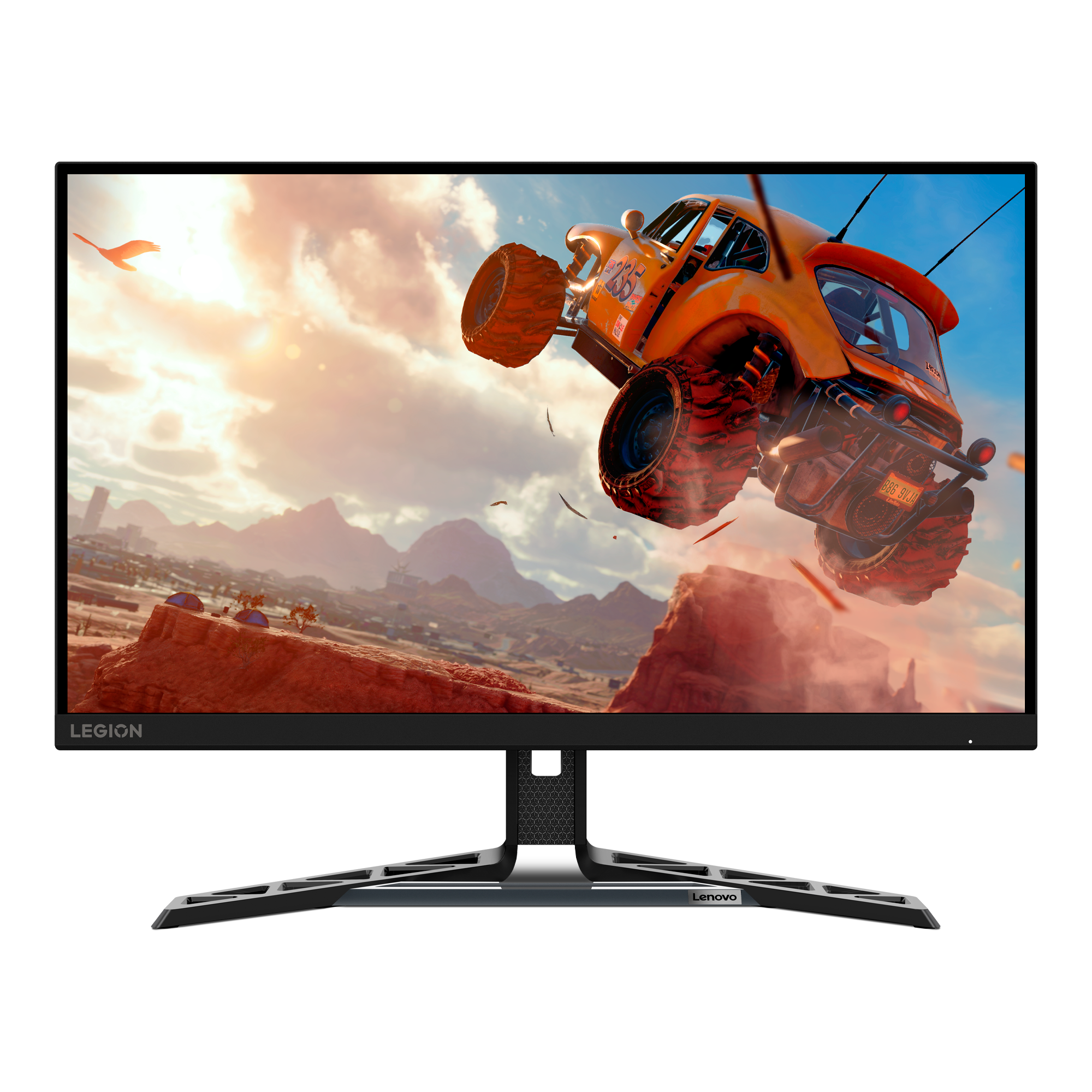 Bir Lenovo Legion monitör, çöl manzarasında zıplayan bir araba gösteriyor. Monitörün siyah çerçevesi ve standı var.