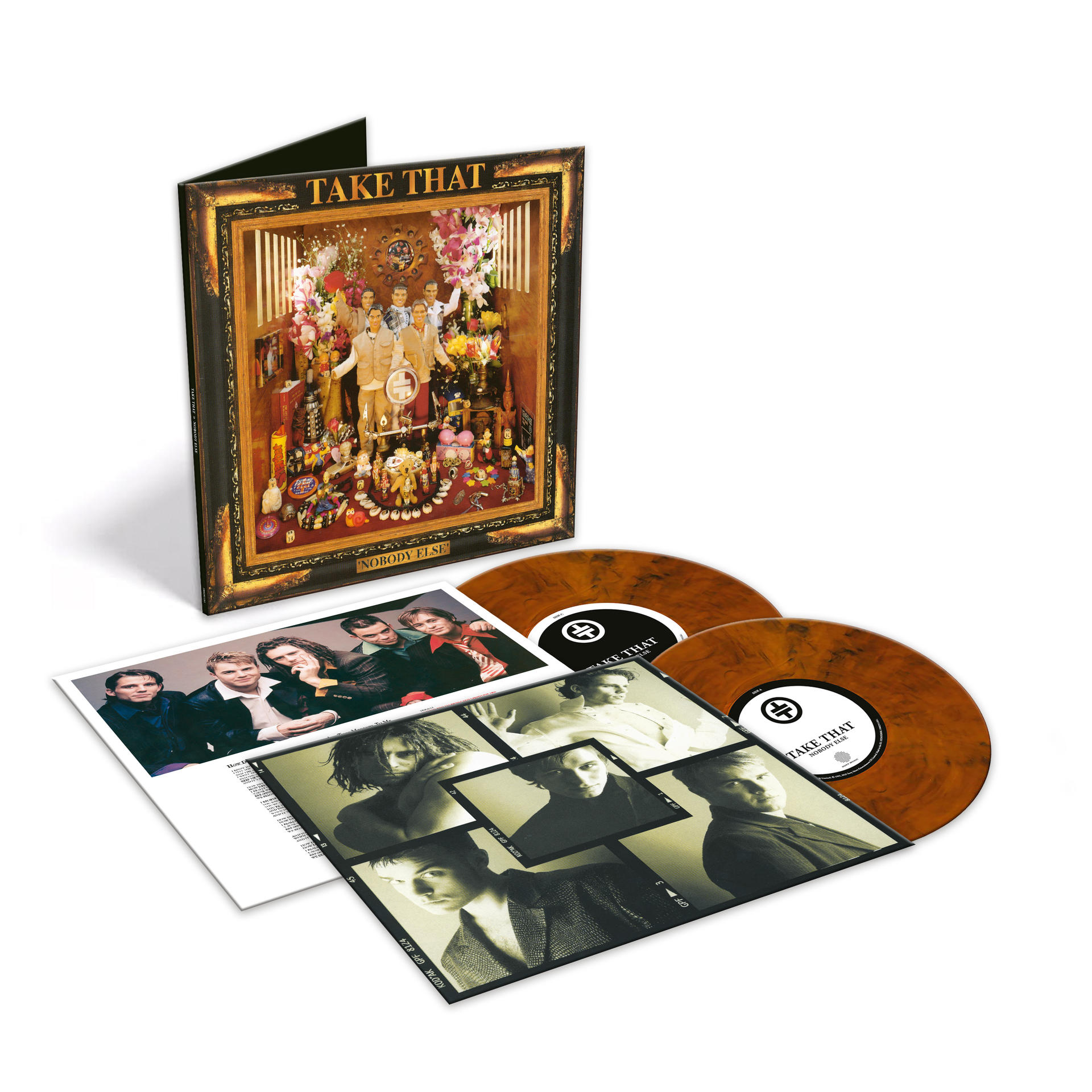 Take That Albumcover, mehrere Bilder, Schallplatten und eine geschlossene Box-Set.