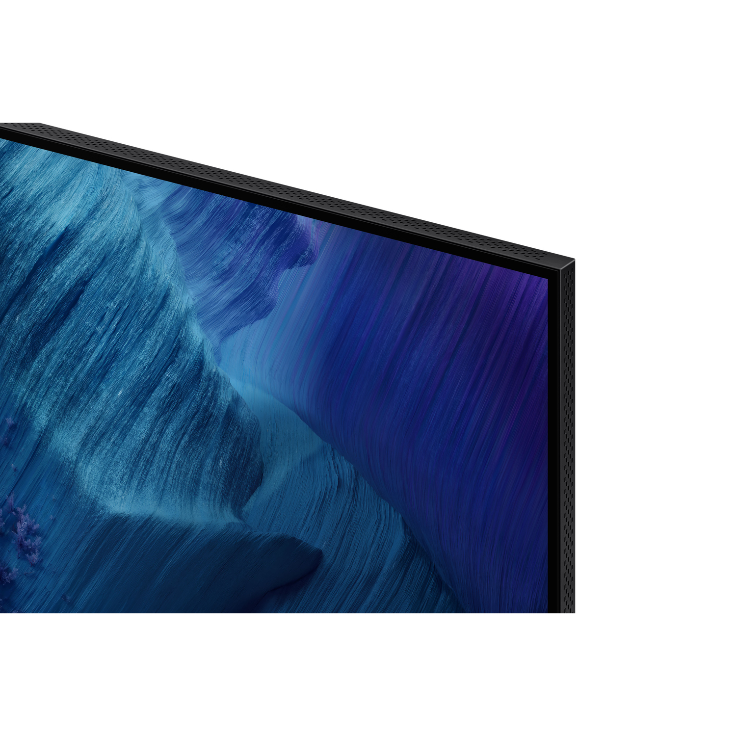 Close-up of a TV screen, showing a blue and purple abstract landscape. The frame is black.