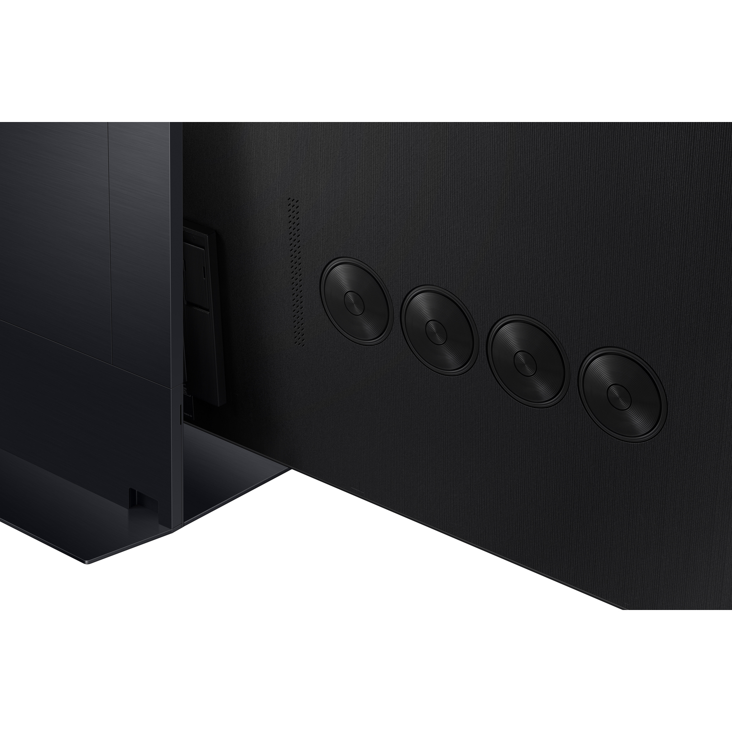 Rear view of a black TV showing circular elements. A black stand is on the left.