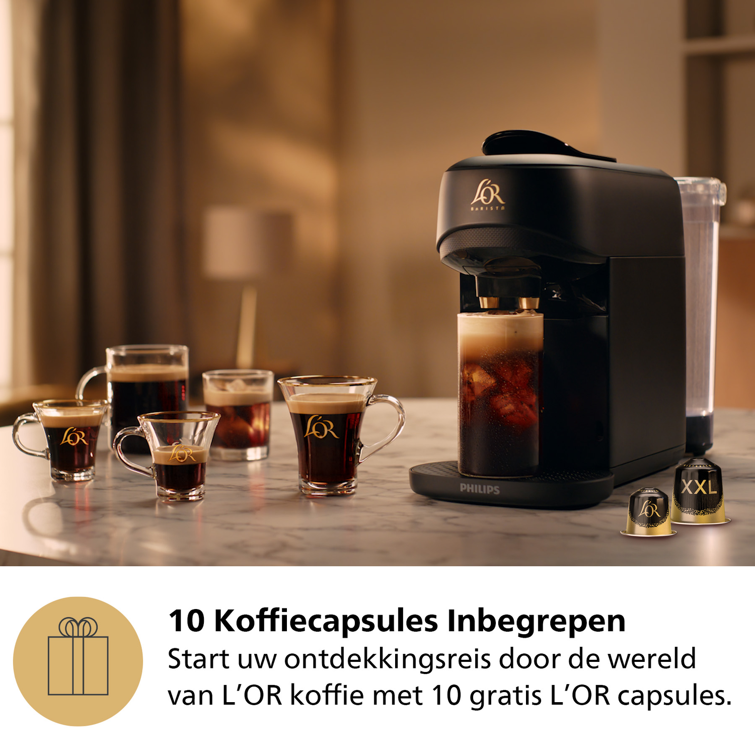 Coffee machine with cups and capsules on a marble surface.