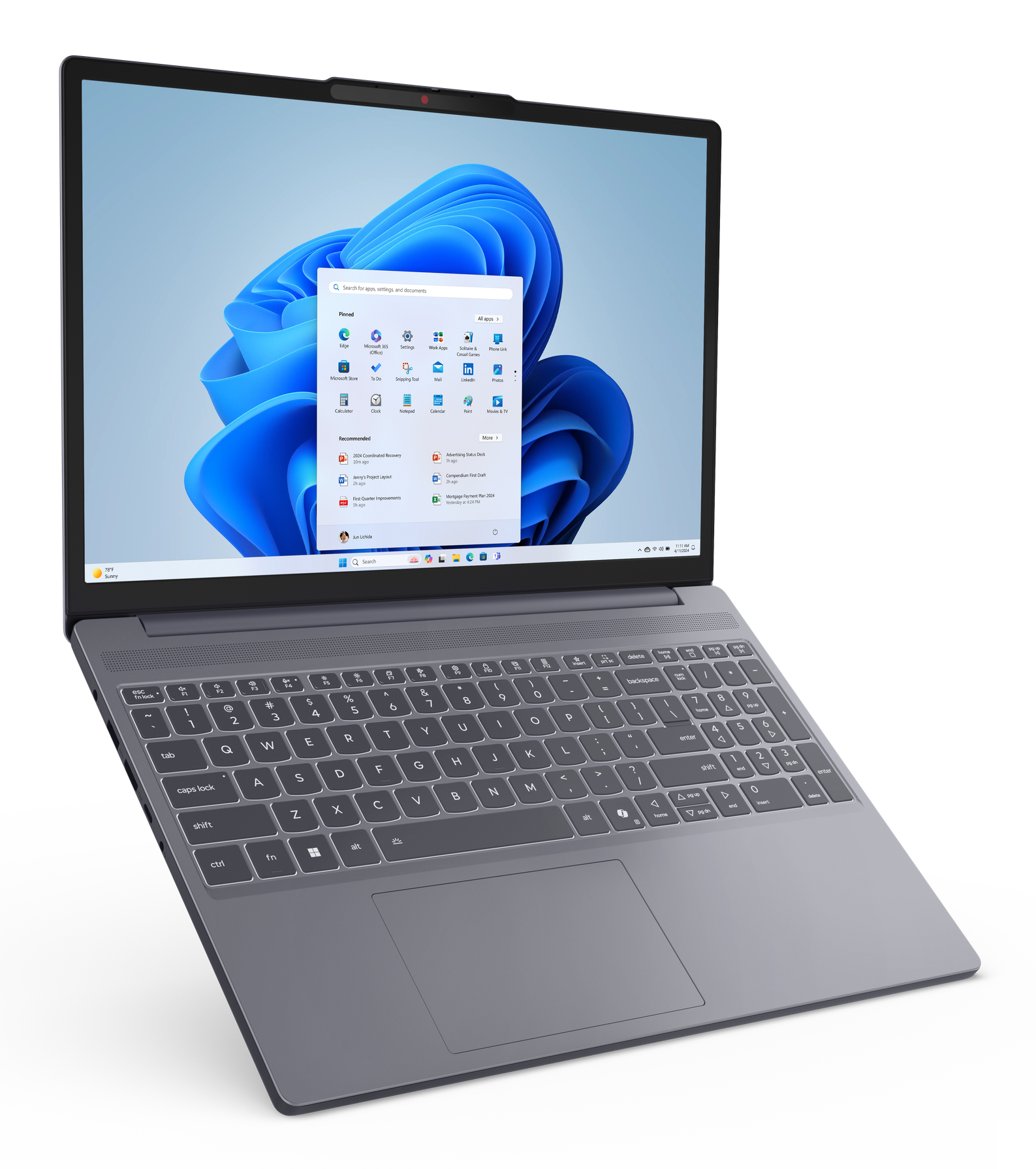 Laptop z otwartym ekranem Windows. Pokazuje listę aplikacji. Ciemnoniebieski.