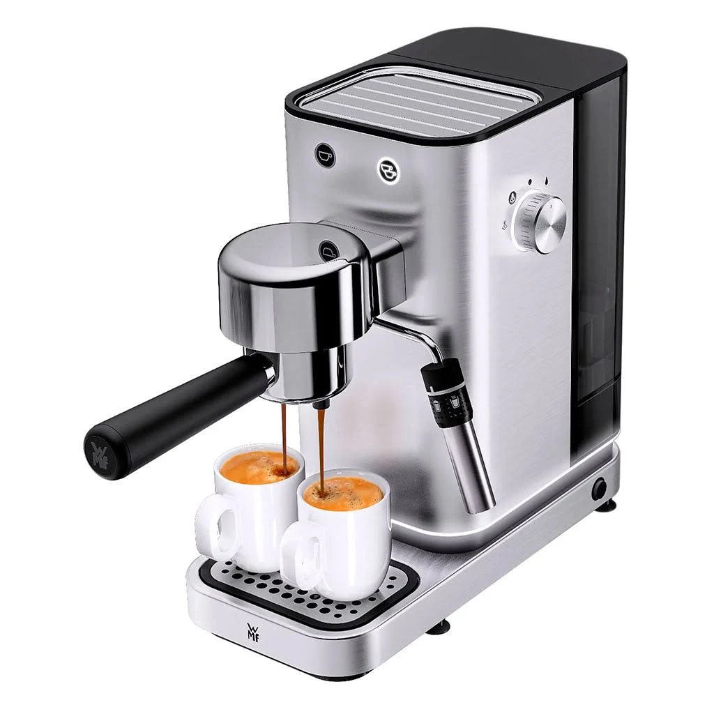 Una máquina de espresso dispensando café en dos tazas blancas. Color plateado y mango negro visibles.