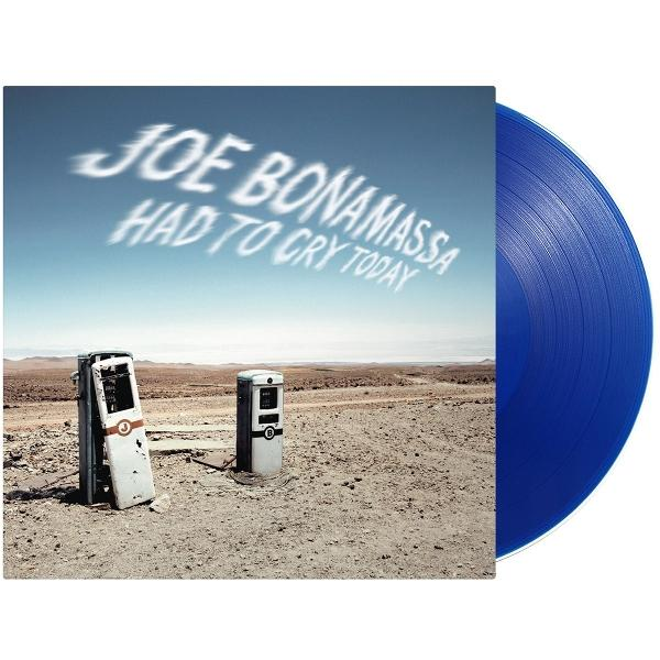 Album borító Joe Bonamassával, szöveg az égen, sivatag és elhagyott benzinkutak.