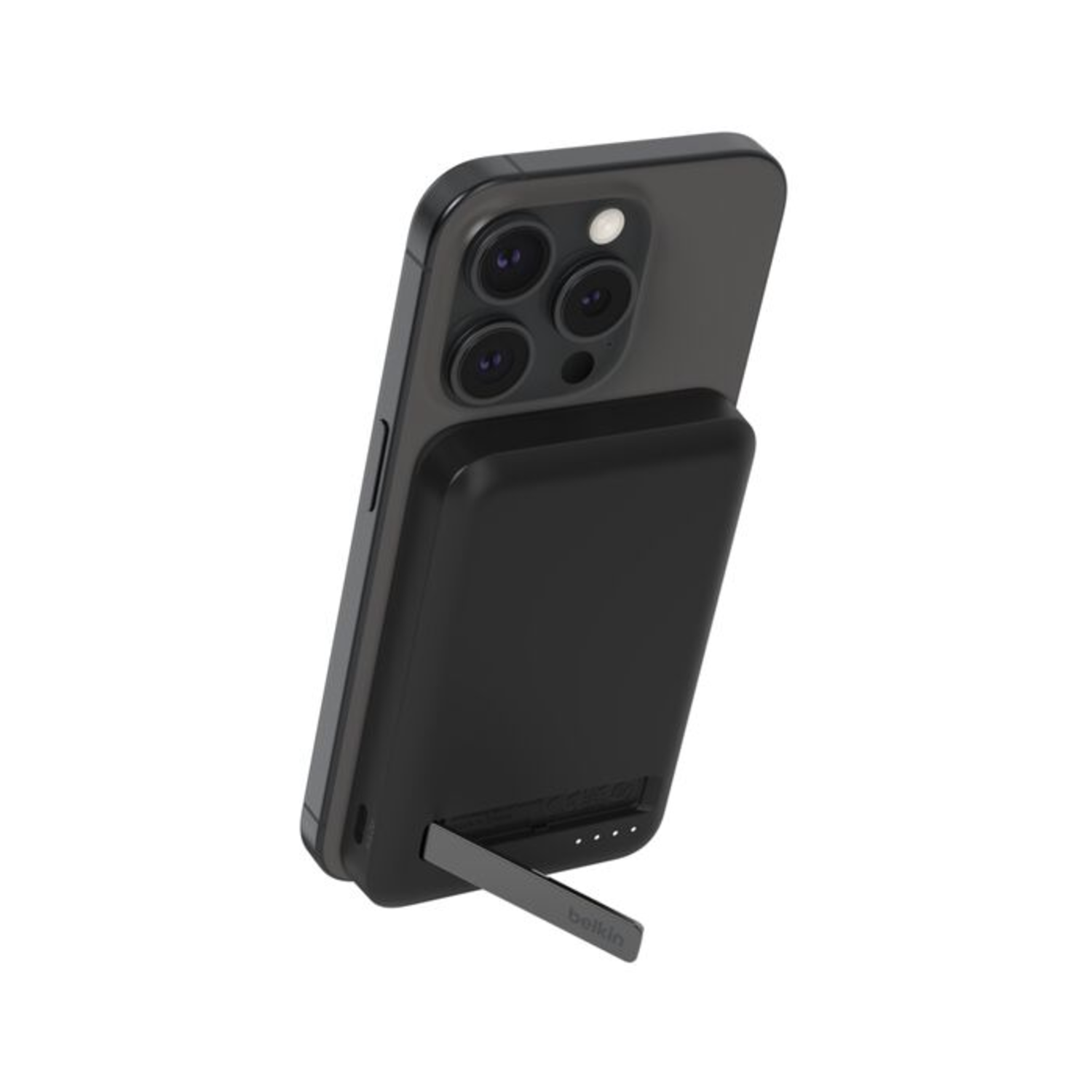 Batterie externe Belkin noire fixée au téléphone. Téléphone soutenu avec un support.
