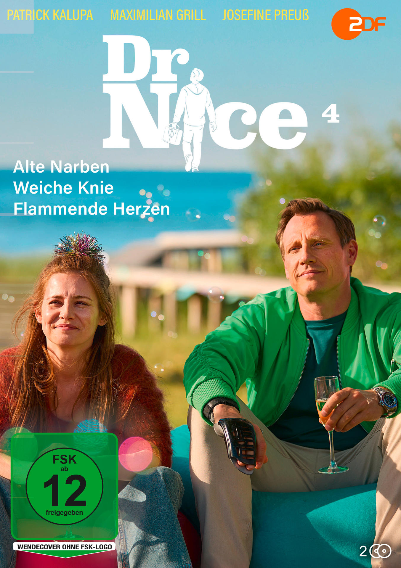 DVD-Hülle, zwei Personen sitzen auf einem Sofa. Text auf Deutsch. Grüner Rating-Aufkleber.