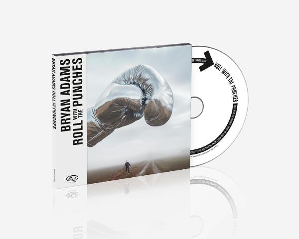 Albumcover: Silberner Boxhandschuh über Straße, Person geht. CD vorhanden.