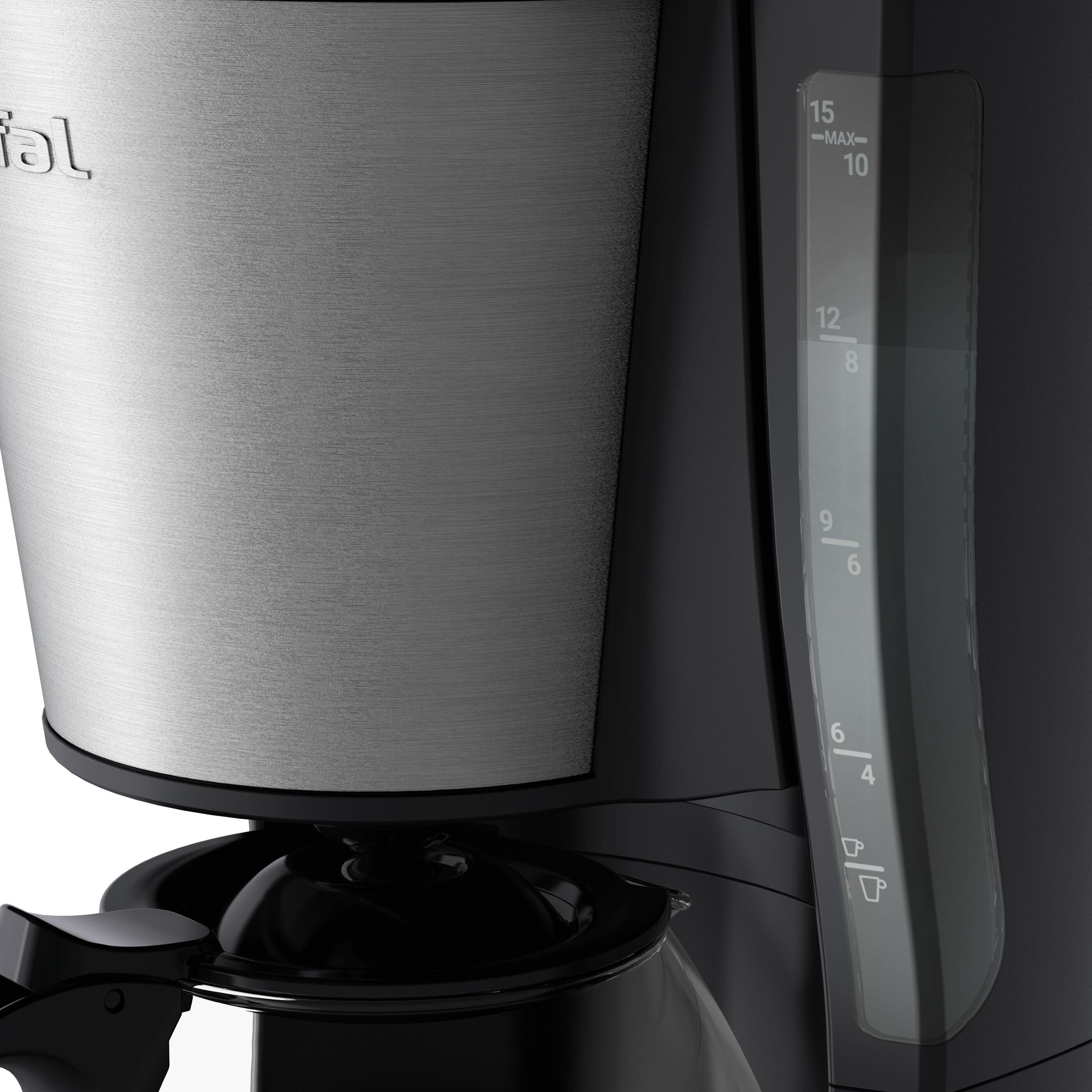 Nahaufnahme einer schwarz-silbernen Kaffeemaschine mit Wasserstandsanzeige an der Seite.
