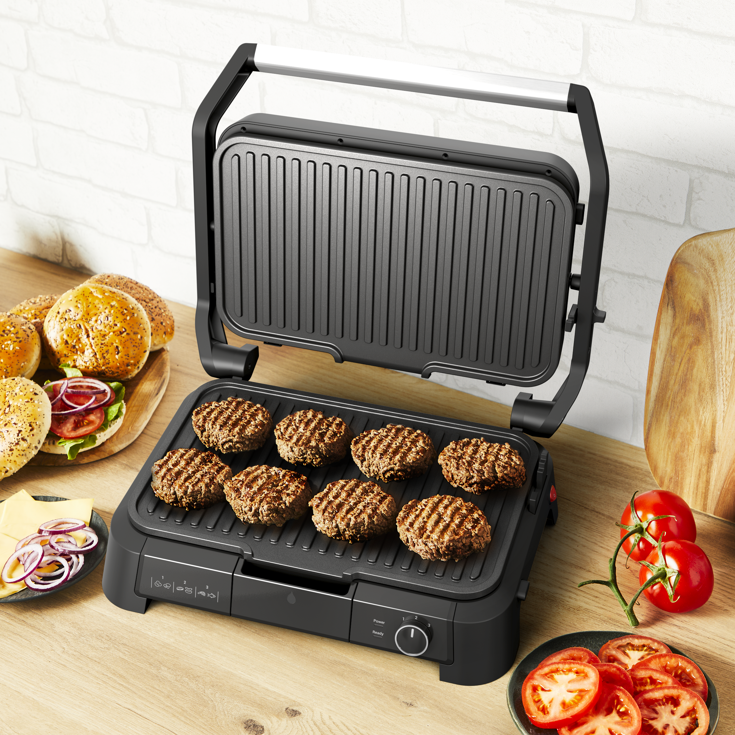 Hamburgherek sülnek egy Tefal Supergrillen, zsemlékkel és feltétekkel a közelben.