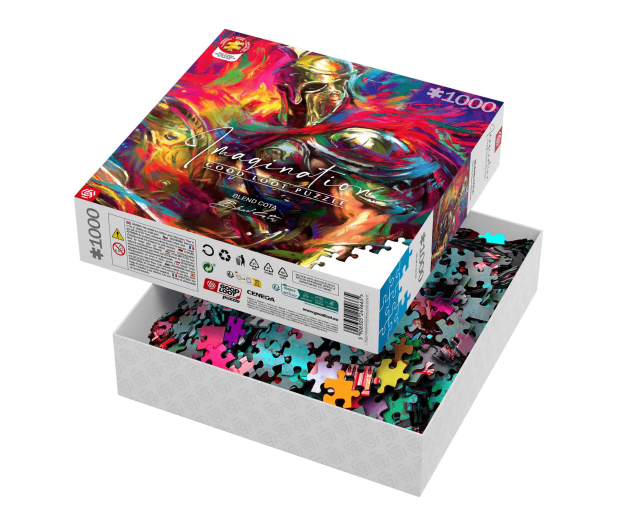 Pudełko z puzzlami z elementami wewnątrz białego pudełka, kolorowy obraz.