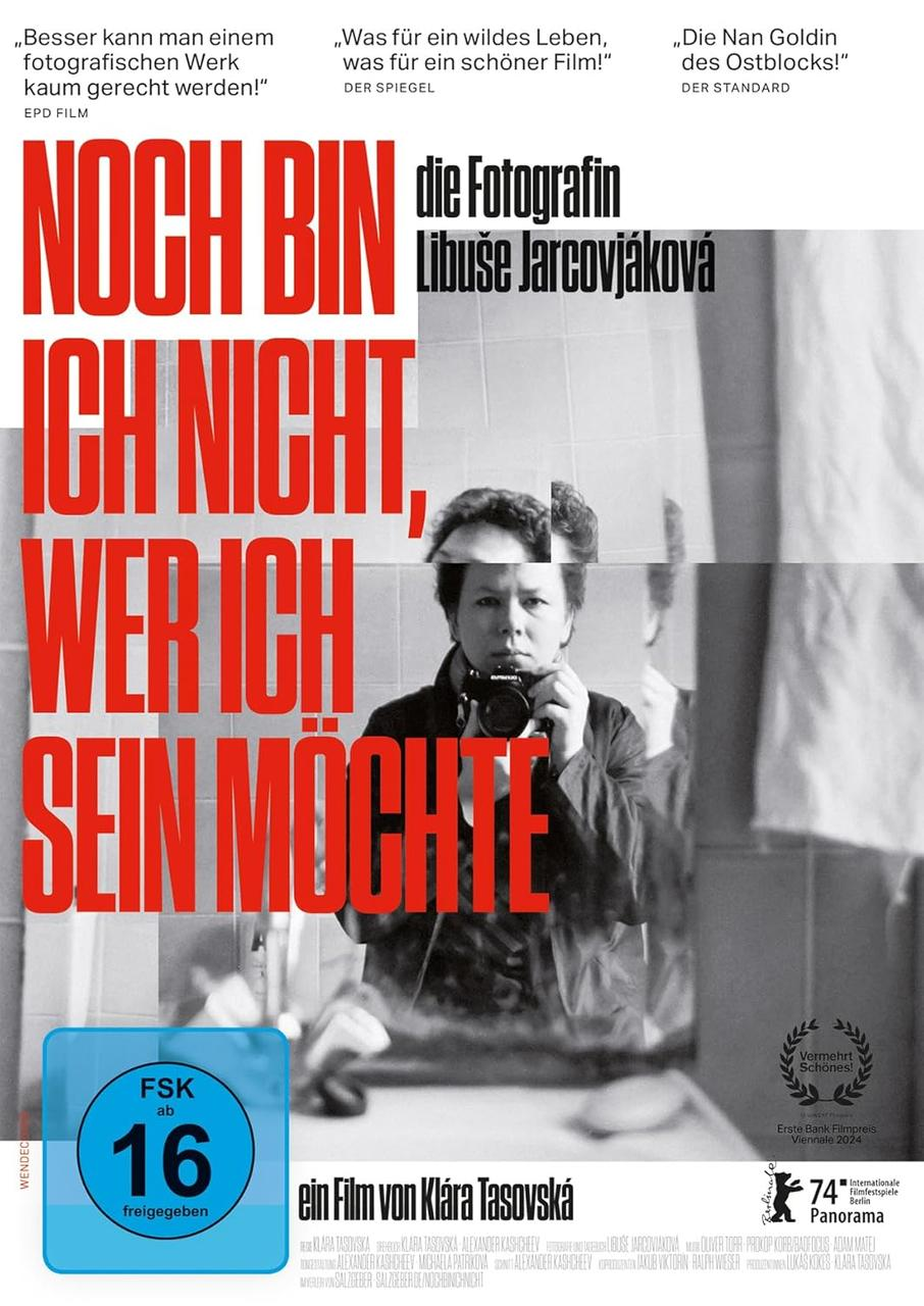 Filmposter: Frau mit Kamera, Text: 'NOCH BIN ICH NICHT, WER ICH SEIN MÖCHTE'.