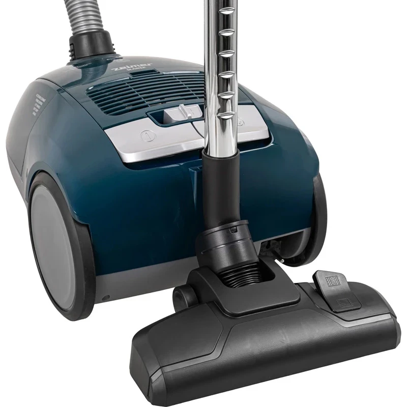 Odkurzacz z głowicą szczotkową i metalową rurą, prezentujący konstrukcję i elementy.