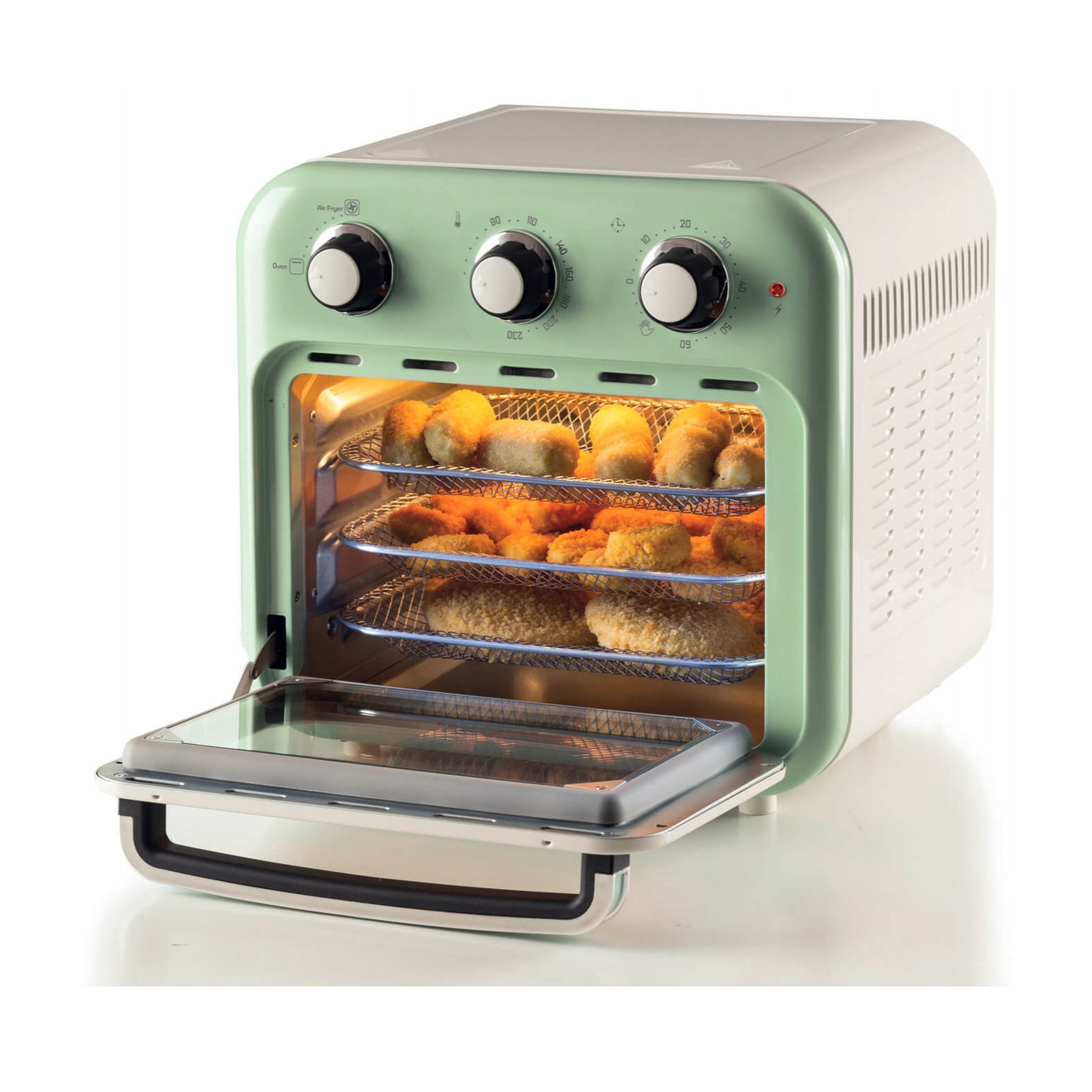 Un forno friggitrice ad aria vintage verde e bianco con tre livelli di cibo e una porta aperta.