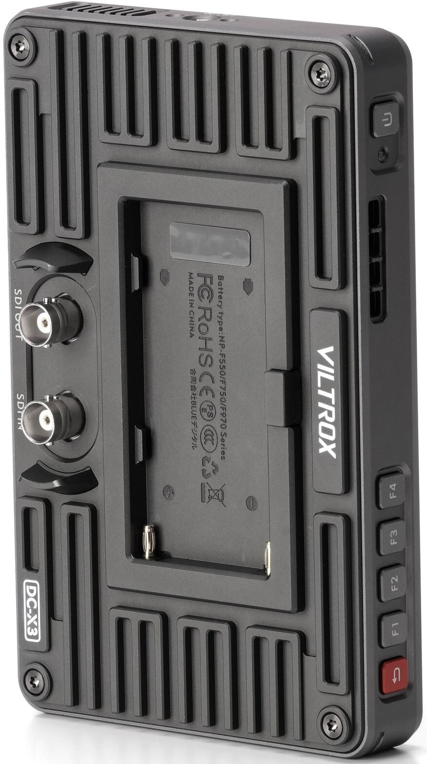 Un appareil Viltrox gris avec ports, boutons et un support de batterie. Il affiche le logo VILTROX sur le côté.