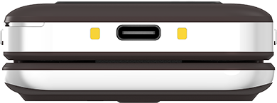 Barna kagylótelefon alulról, USB-C porttal és sárga jelölésekkel.