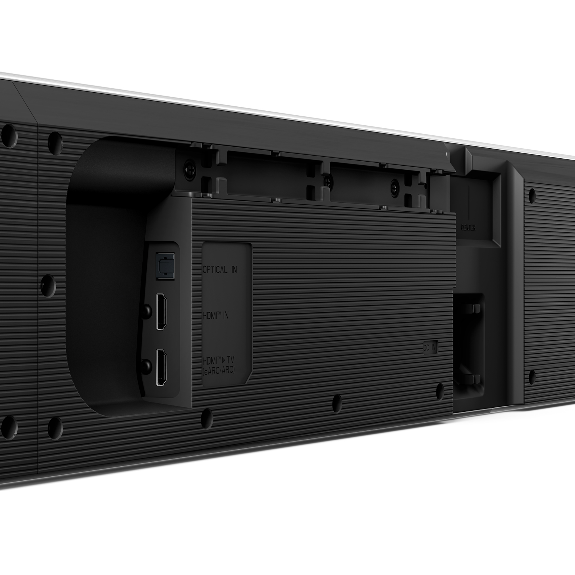 Parte trasera de una barra de sonido negra. Entradas ópticas y HDMI. Puertos y entrada de alimentación visibles.
