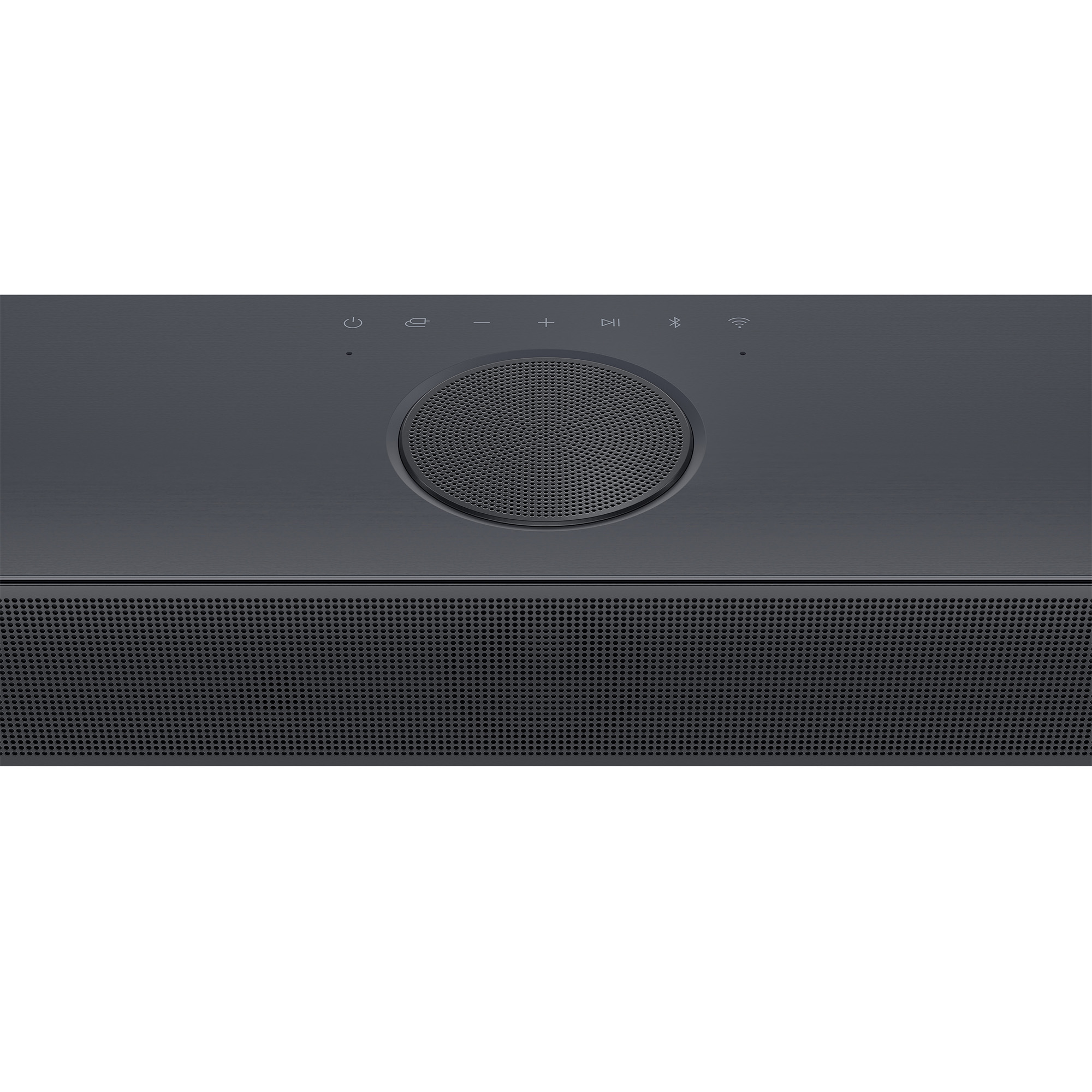 Primer plano de la parte superior de una barra de sonido, mostrando una rejilla de altavoz y botones de control.