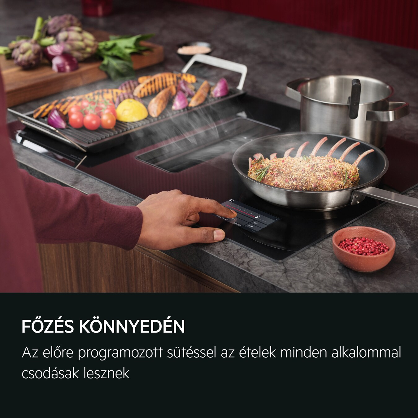Indukciós főzőlap ételekkel a serpenyőkben. Egy kéz megérinti a vezérlőket, a főzés egyszerű.