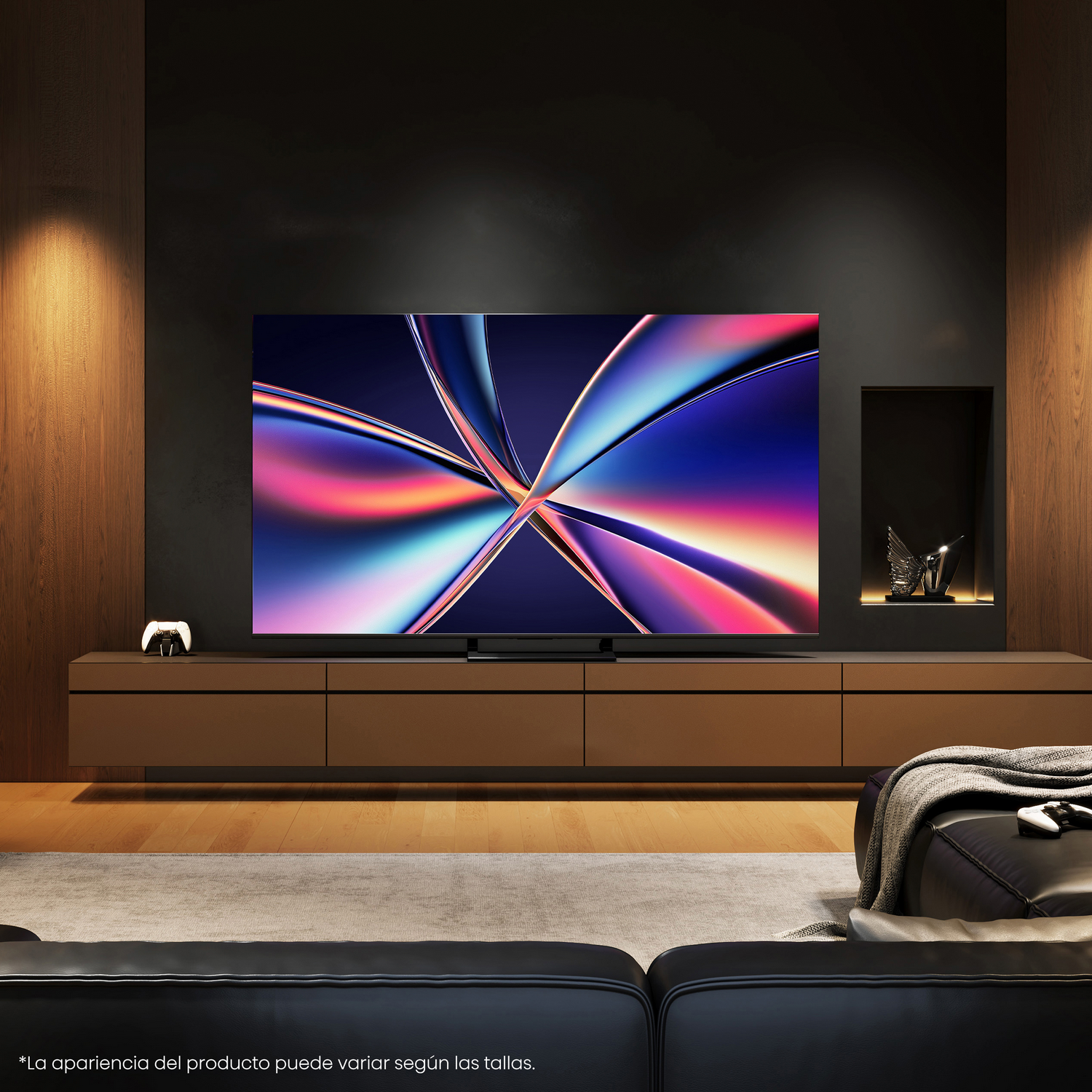 Un televisor está sobre un soporte en una habitación oscura.