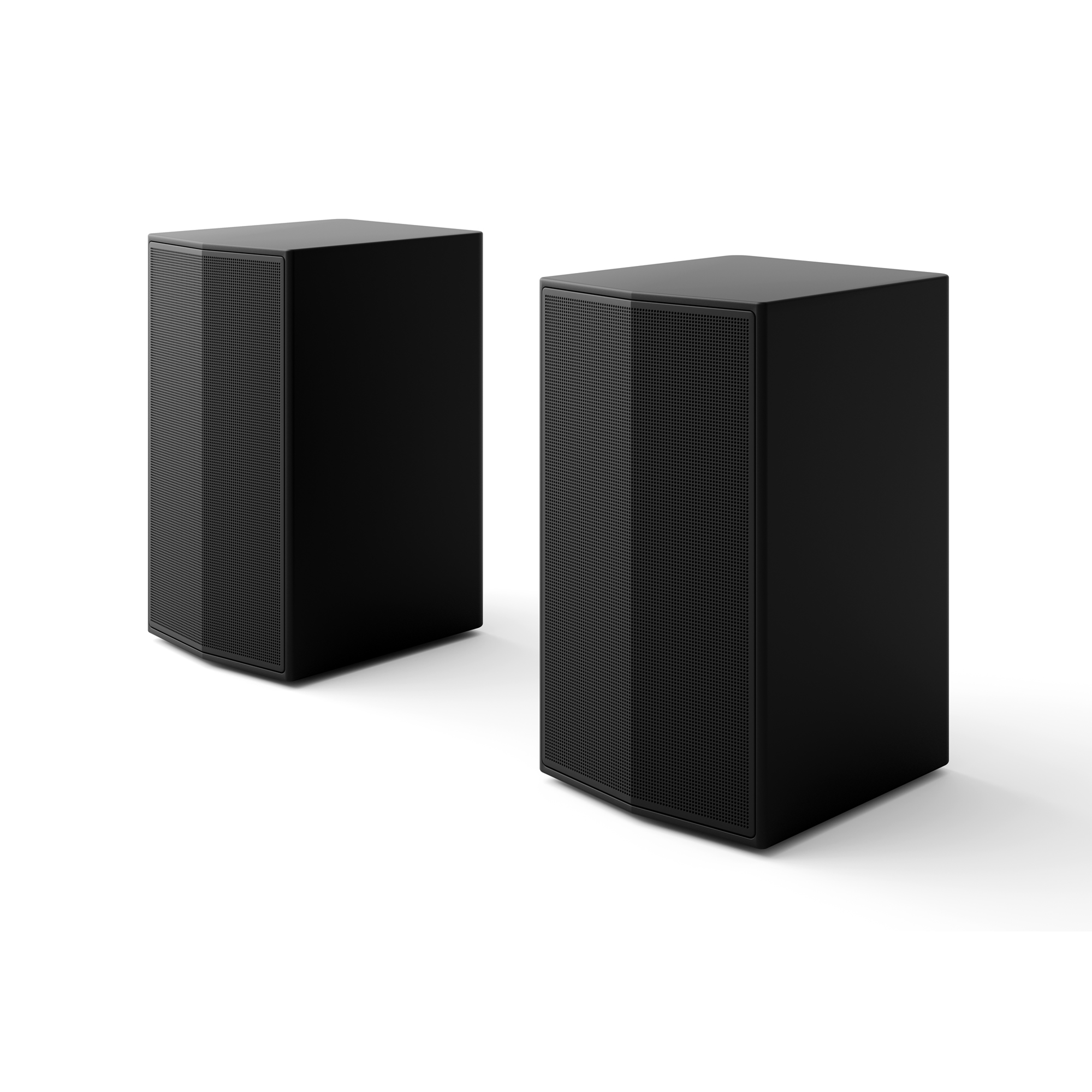 Dos cajas de altavoces negras y rectangulares una al lado de la otra sobre un fondo blanco.