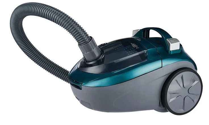 Turkusowy odkurzacz z dołączonym wężem. Odkurzacz jest szary i turkusowy.