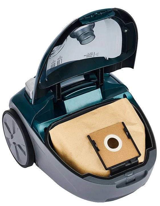 Odkurzacz z otwartą pokrywą i workiem.