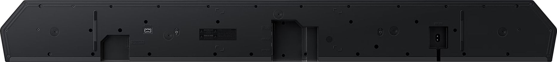 Arrière d'une barre de son noire avec divers ports et connexions.