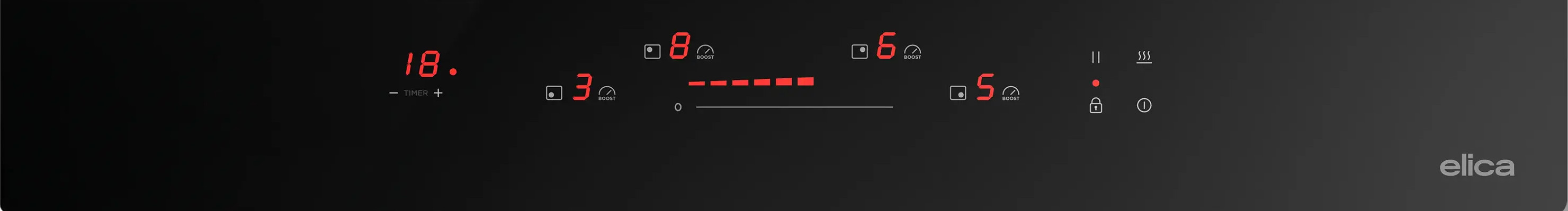 Zbliżenie płyty indukcyjnej z czerwonymi cyframi i symbolami.