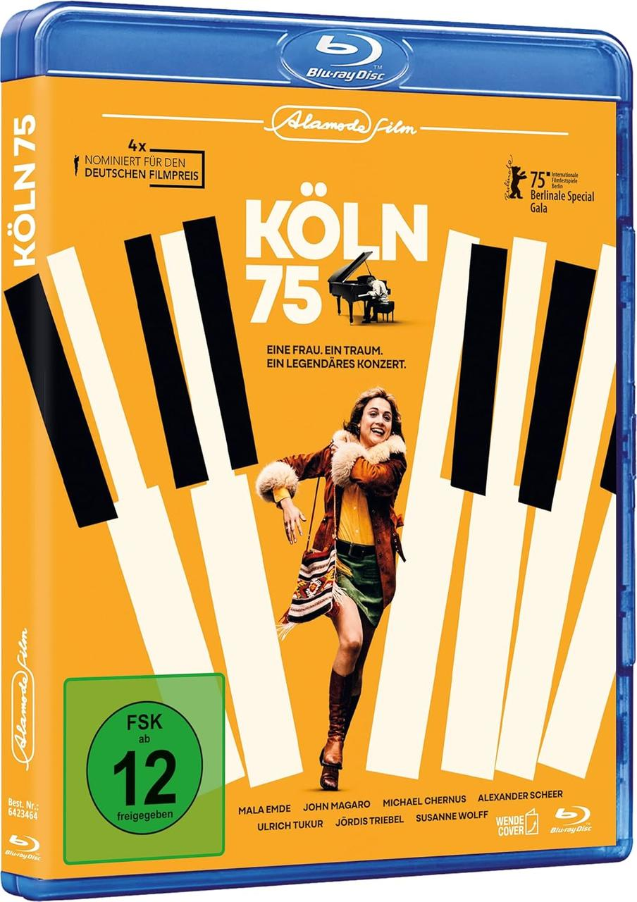 DVD-Hülle mit einer Frau auf einer Bühne mit Klaviertastatur-Hintergrund. Text auf Deutsch.