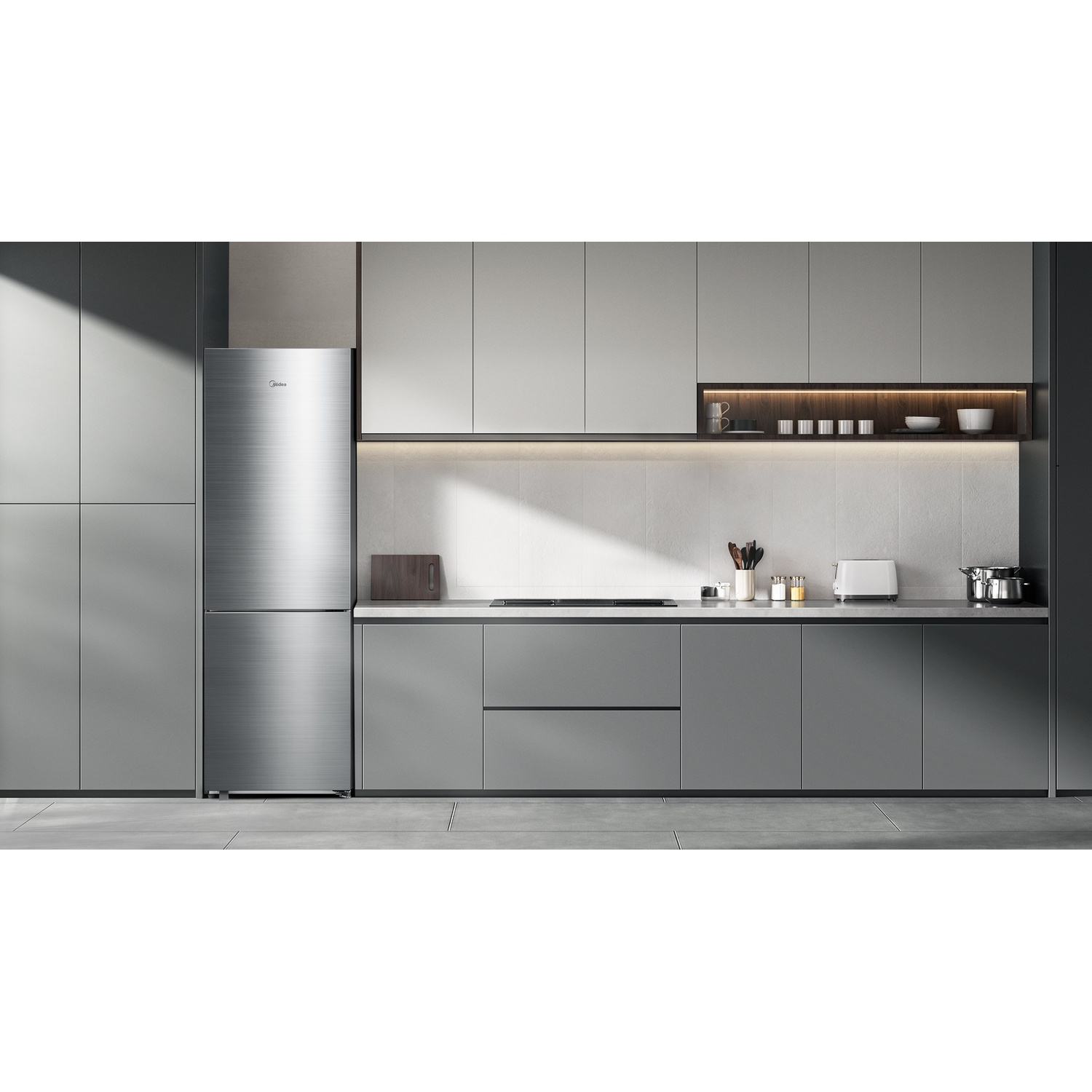 Cucina moderna con un frigorifero in acciaio inossidabile e armadi grigi.