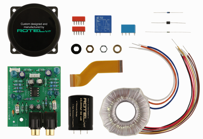 Ein Satz elektronischer Komponenten, darunter ein Lautsprecher, Widerstände und Kondensatoren.