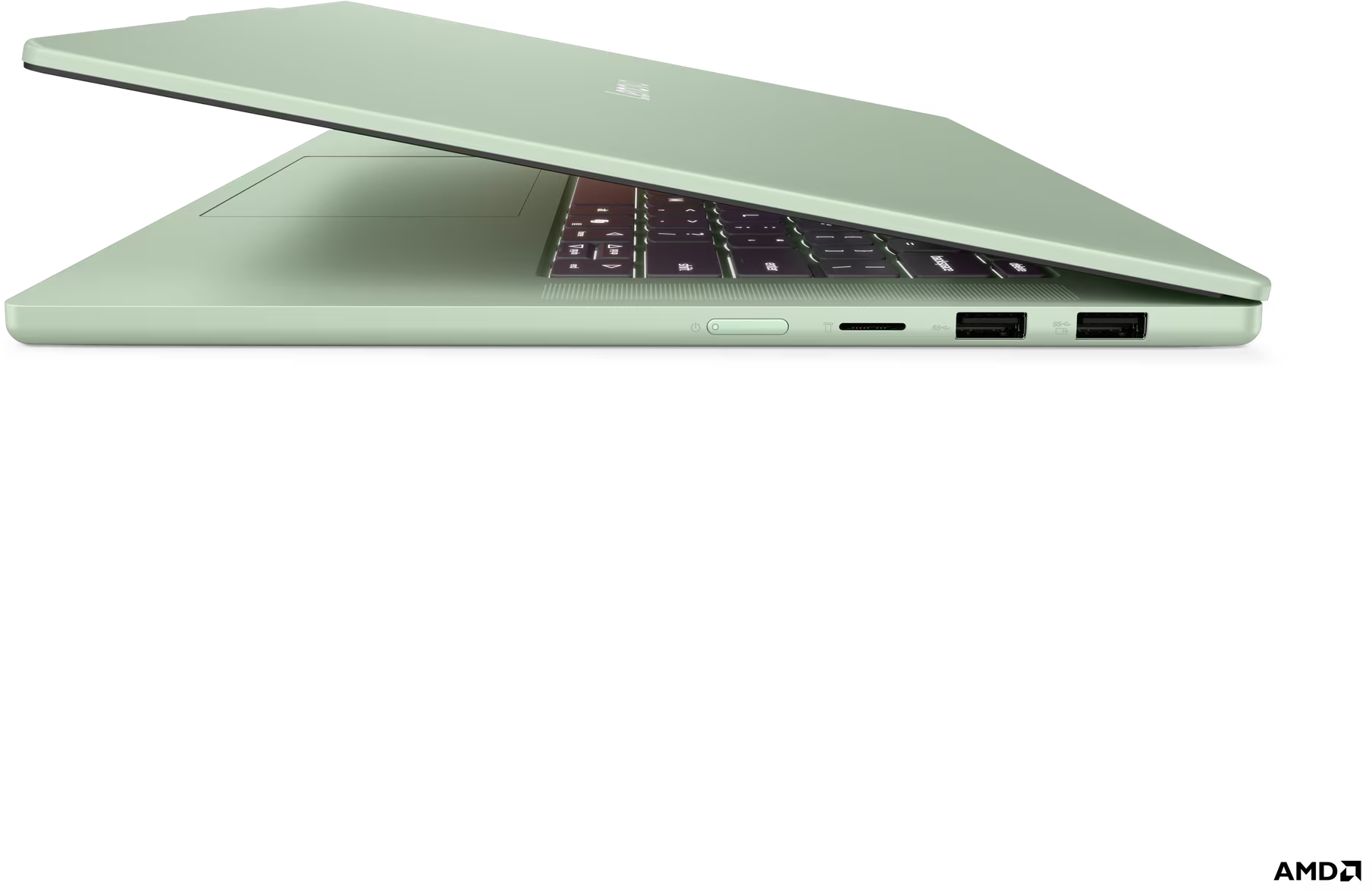 Világoszöld laptop nyitott szögben. A billentyűzet látható. Fekete háttér.
